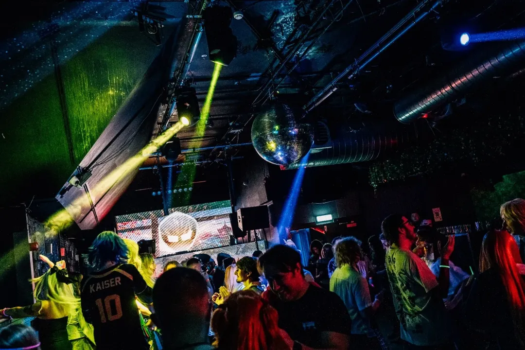 The Anime Disco dancefloor with the NerdyNI logo on screen