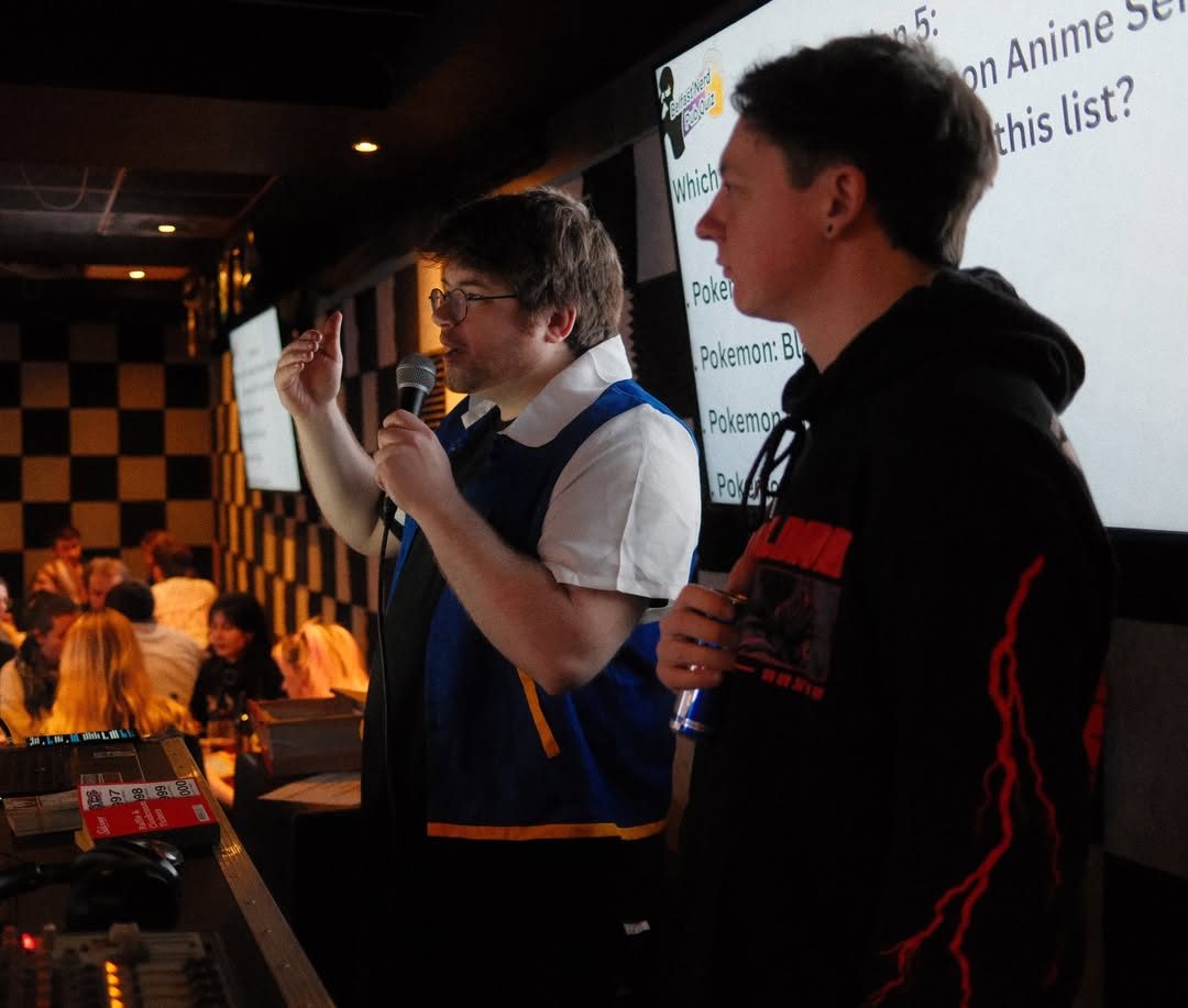 Callum hosting the Pokémon quiz dressed as Ash Ketchum